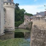 a stone wall with a tower