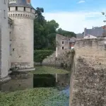 a stone wall with a tower