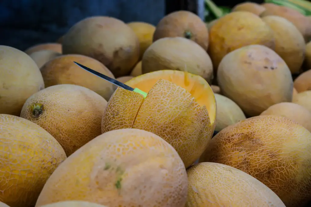 a pile of yellow fruit sitting next to each other