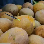 a pile of yellow fruit sitting next to each other