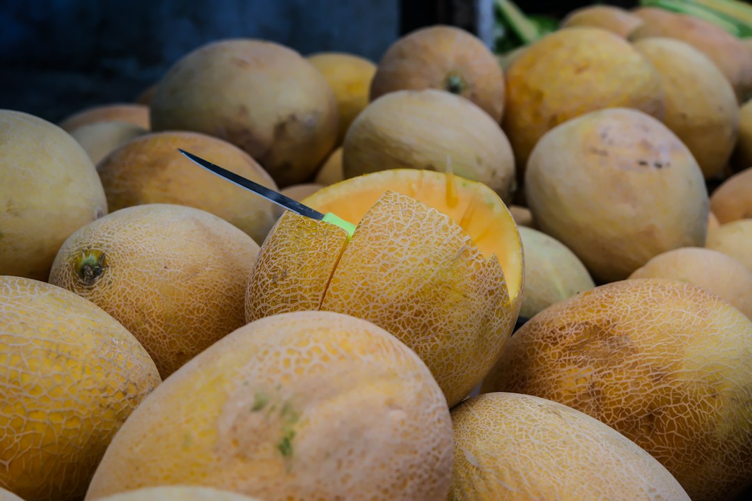 a pile of yellow fruit sitting next to each other